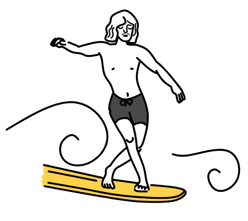 Man surfing on a yellow surfboardunder